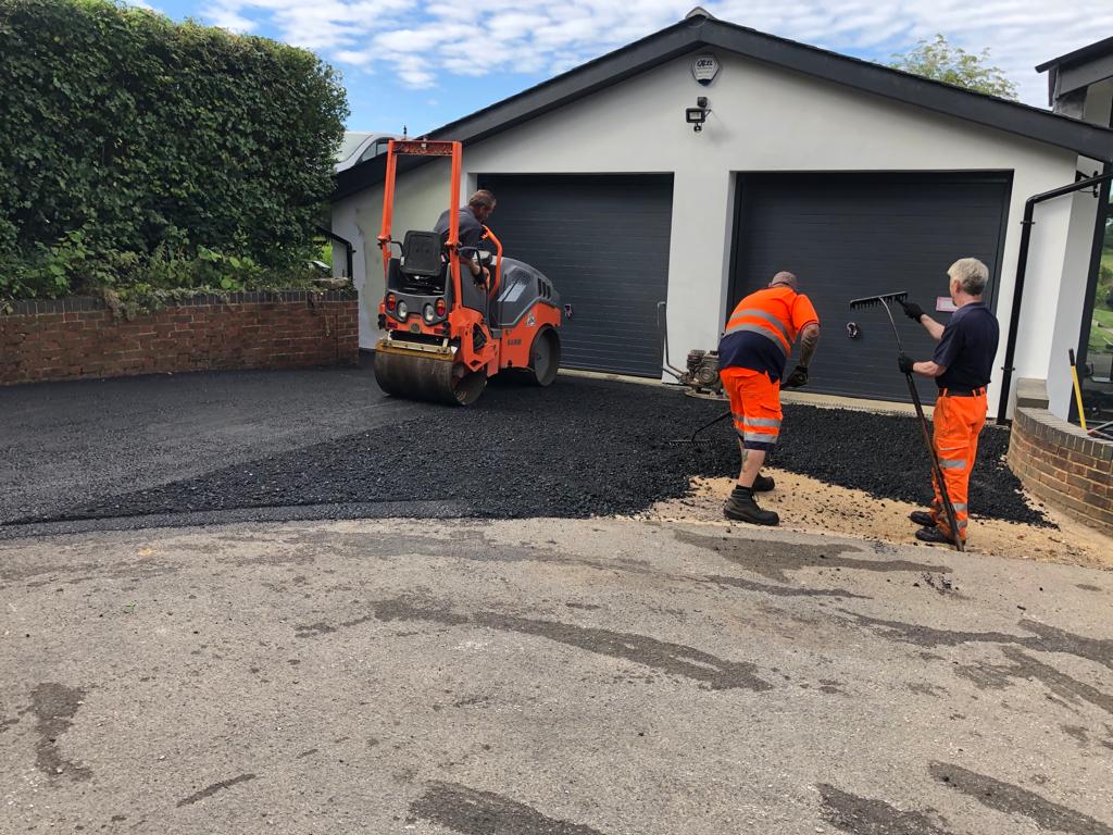 This is a photo of a bitumen driveway which is in the process of being installed by Griffith Road Tek