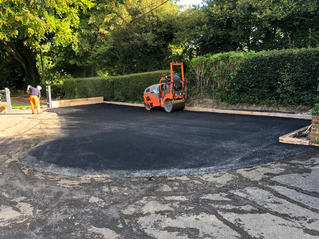 This is a photo of a bitumen driveway which is in the process of being installed by Griffith Road Tek